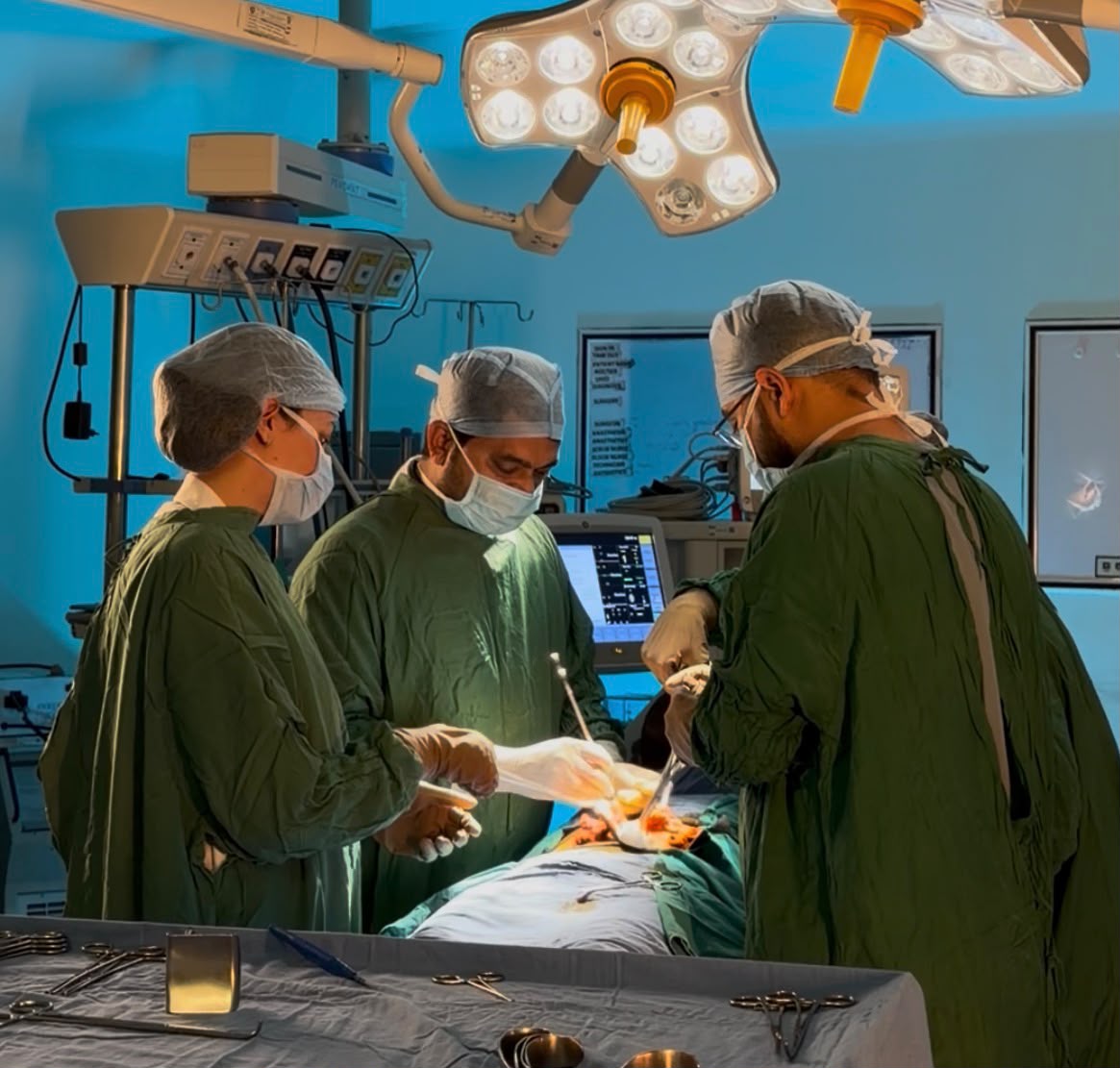Surgical team performing an operation